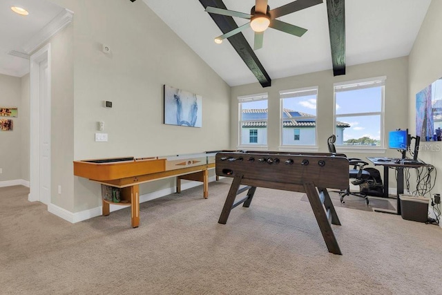 playroom with beamed ceiling, baseboards, and carpet