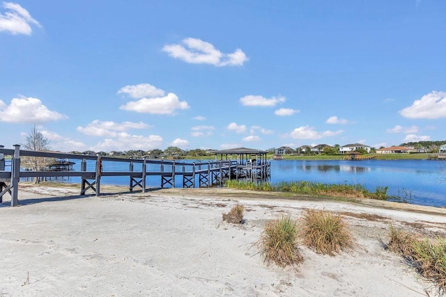 dock area with a water view