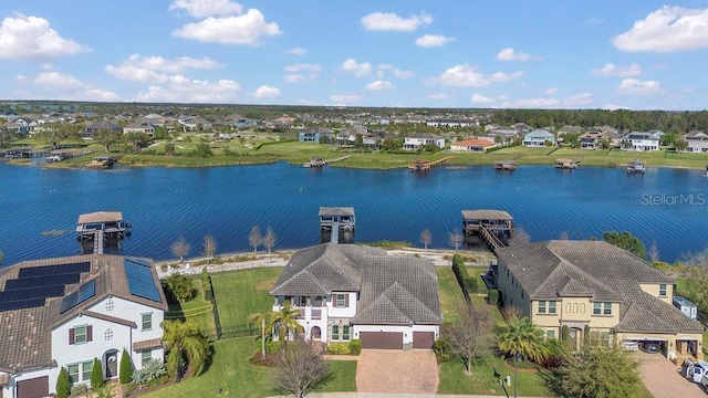 aerial view with a residential view and a water view