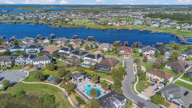 aerial view featuring a residential view and a water view