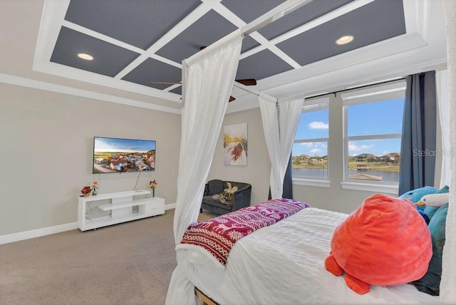 carpeted bedroom with ceiling fan, coffered ceiling, crown molding, and baseboards