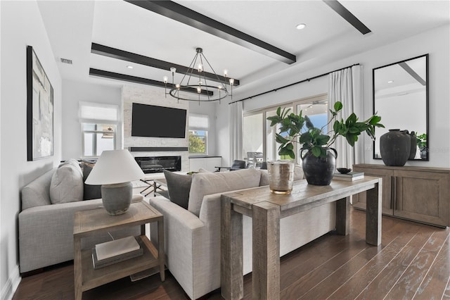 8025 Topsail Pl, Winter Garden, FL 34787 - living area with beam ceiling, dark wood finished floors, a chandelier, a fireplace, and recessed lighting