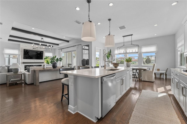 8025 Topsail Pl, Winter Garden, FL 34787 - kitchen with dishwasher, a sink, light countertops, white cabinetry, and recessed lighting