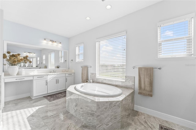 8025 Topsail Pl, Winter Garden, FL 34787 - full bathroom featuring vanity, a garden tub, marble finish flooring, baseboards, and recessed lighting