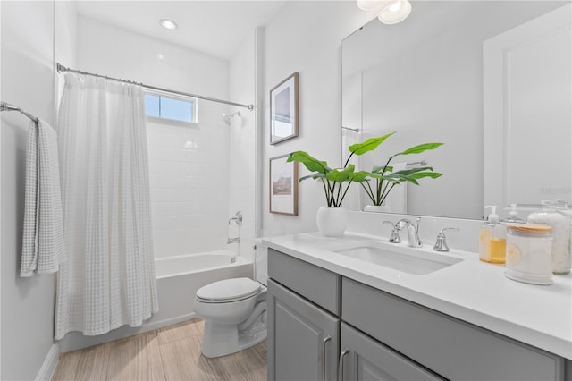 8025 Topsail Pl, Winter Garden, FL 34787 - full bath with vanity, toilet, shower / tub combo with curtain, and wood finished floors