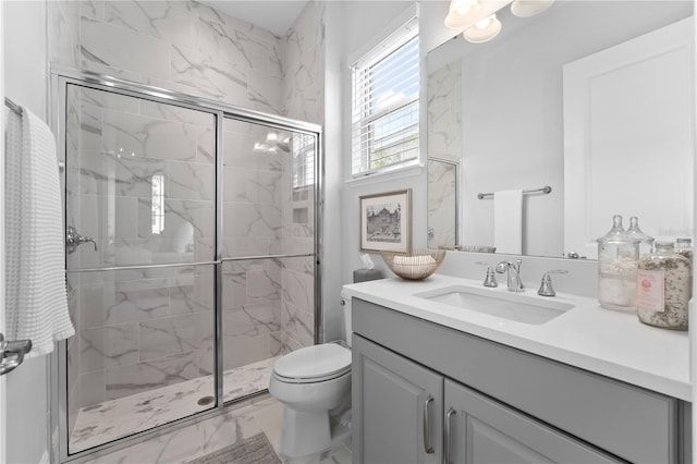 8025 Topsail Pl, Winter Garden, FL 34787 - bathroom with vanity, marble look tiles, toilet, and a marble finish shower