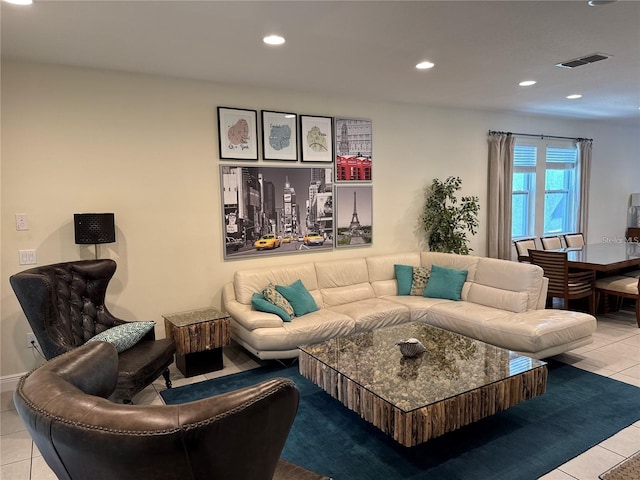 living room featuring recessed lighting, visible vents, and tile patterned floors