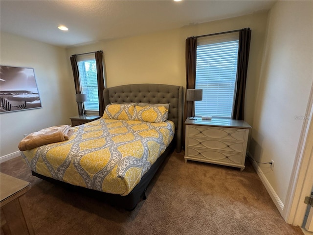 bedroom featuring recessed lighting, carpet, and baseboards