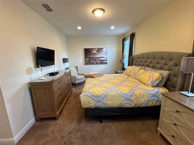 carpeted bedroom with recessed lighting, visible vents, a textured ceiling, and baseboards