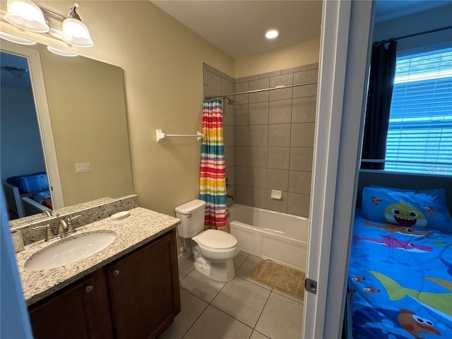 bathroom with shower / bathtub combination with curtain, vanity, toilet, and tile patterned floors