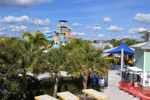 exterior space with playground community and fence