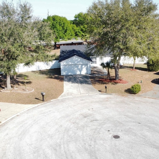 view of front of house featuring fence