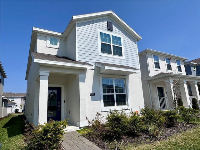 view of front of home featuring stucco siding