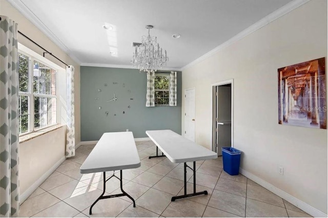 dining space with light tile patterned floors, baseboards, and ornamental molding