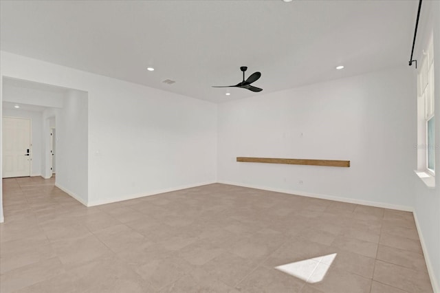 spare room with baseboards, visible vents, ceiling fan, and recessed lighting