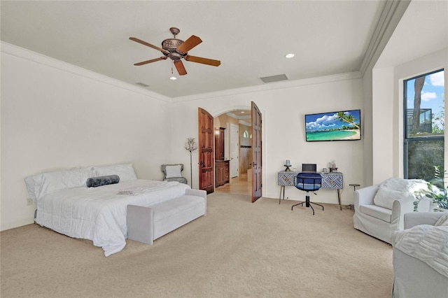 bedroom with visible vents, arched walkways, light carpet, and ornamental molding