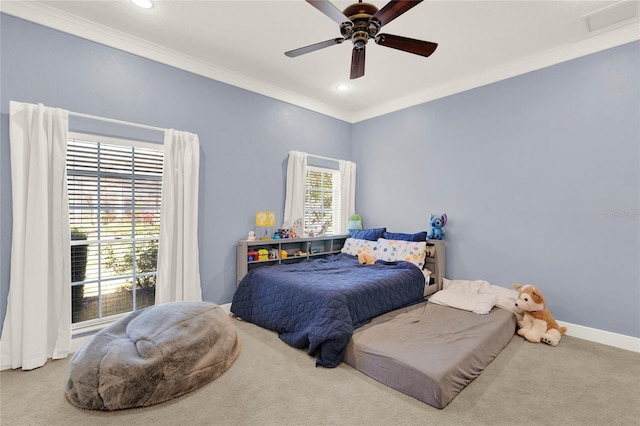 bedroom with a ceiling fan, baseboards, recessed lighting, crown molding, and carpet flooring