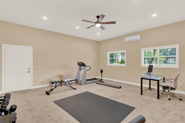 exercise area with a wall unit AC, recessed lighting, baseboards, and carpet floors