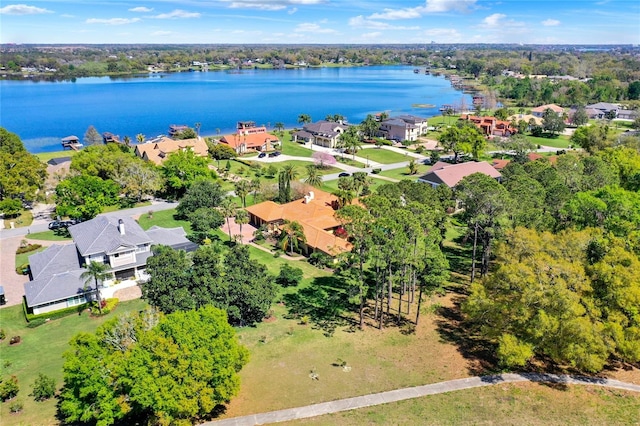 aerial view with a residential view and a water view