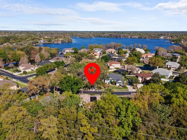 bird's eye view featuring a residential view and a water view