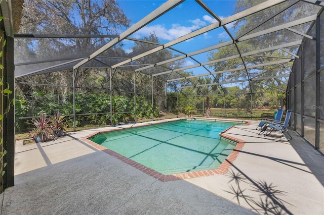 pool with a patio and a lanai