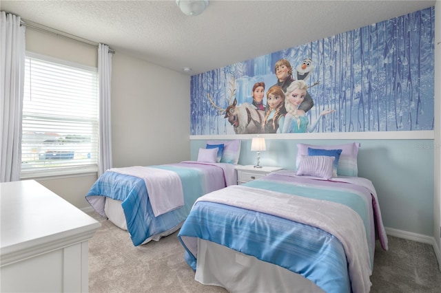 bedroom featuring wallpapered walls, baseboards, carpet, and a textured ceiling