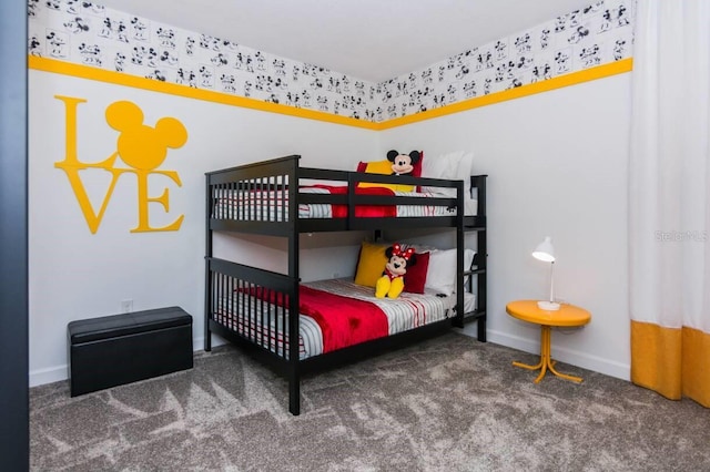 bedroom with carpet flooring and baseboards