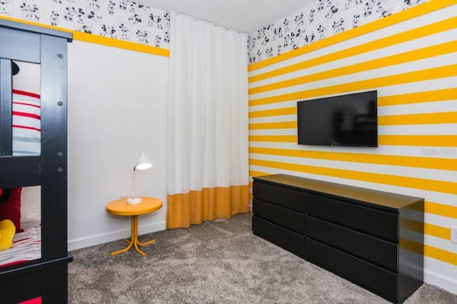 bedroom with carpet floors, baseboards, and wallpapered walls