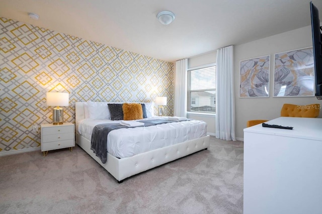 bedroom featuring carpet floors, baseboards, and wallpapered walls