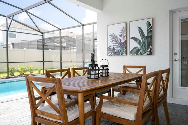 interior space featuring a sunroom and brick floor