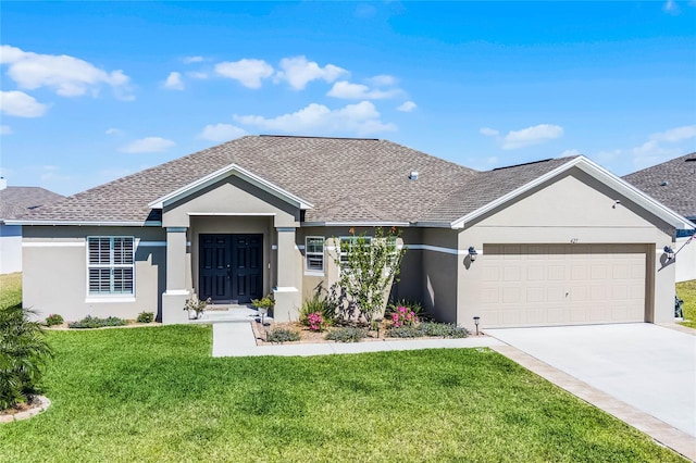 ranch-style house with a shingled roof, concrete driveway, a front yard, stucco siding, and a garage