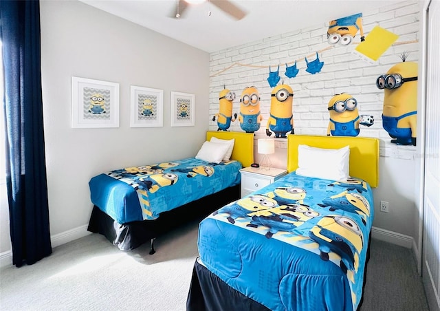 bedroom featuring a ceiling fan, brick wall, carpet flooring, and baseboards