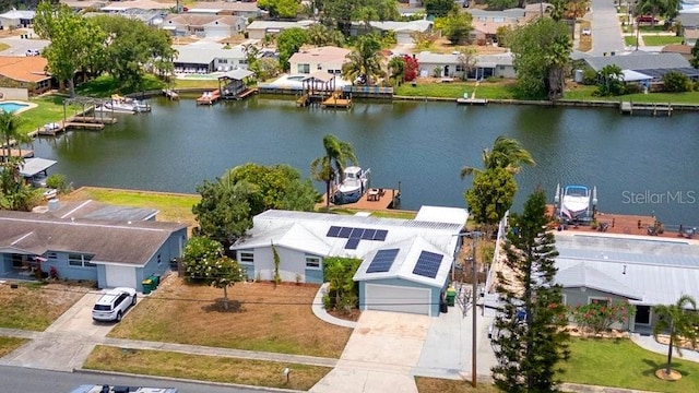 aerial view featuring a water view and a residential view