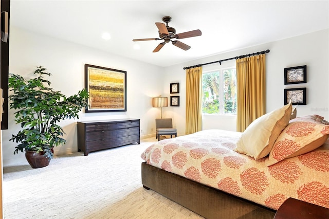 bedroom with carpet flooring and a ceiling fan