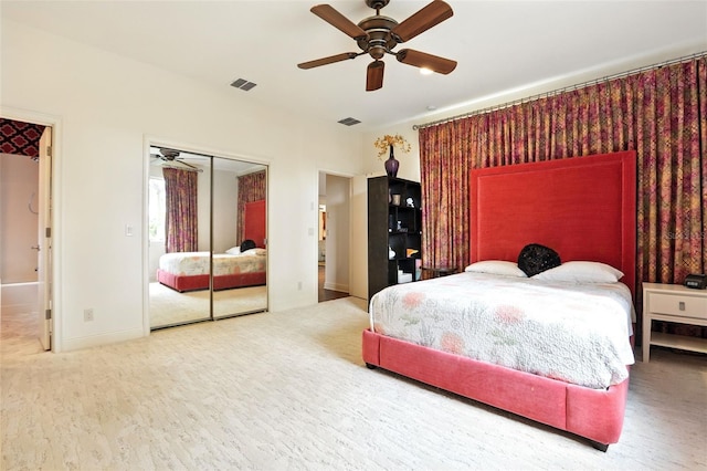 bedroom with a ceiling fan and visible vents