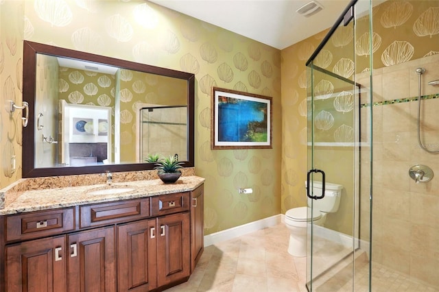 bathroom featuring baseboards, a stall shower, visible vents, and wallpapered walls