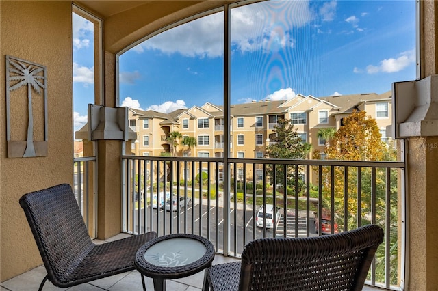 balcony featuring a residential view