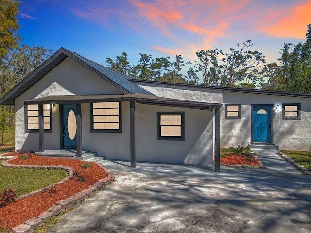 view of front of home with stucco siding