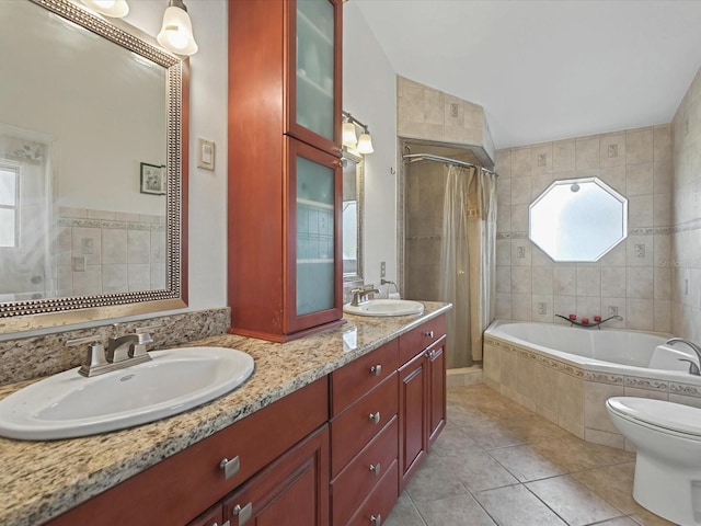 bathroom featuring tile patterned flooring, a tile shower, tiled tub, and a sink