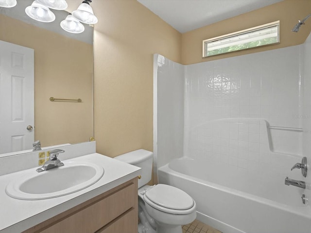 full bath with tile patterned floors, shower / bathtub combination, toilet, and vanity