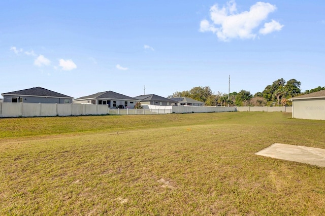 view of yard with fence