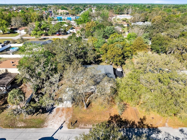 aerial view with a wooded view