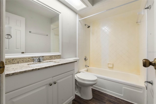 full bathroom featuring vanity, shower / bathing tub combination, toilet, and wood finished floors