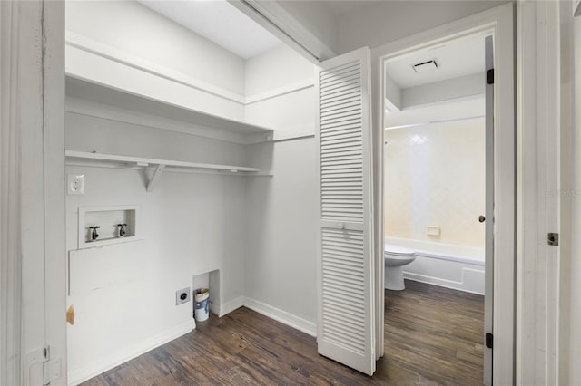 laundry room with hookup for a washing machine, visible vents, hookup for an electric dryer, laundry area, and dark wood-type flooring