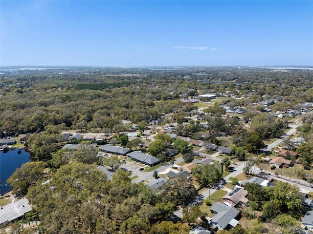 bird's eye view with a residential view and a water view