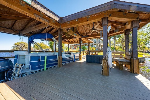 wooden deck with a water view