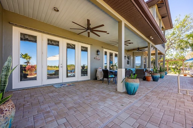 view of patio / terrace with french doors, outdoor lounge area, and ceiling fan