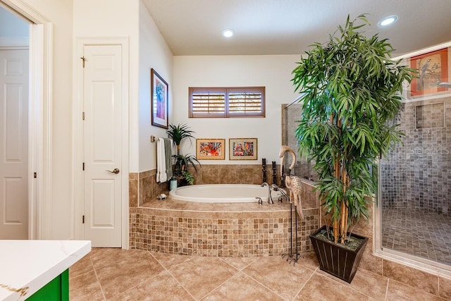 full bathroom with tiled bath, recessed lighting, tile patterned floors, and a tile shower