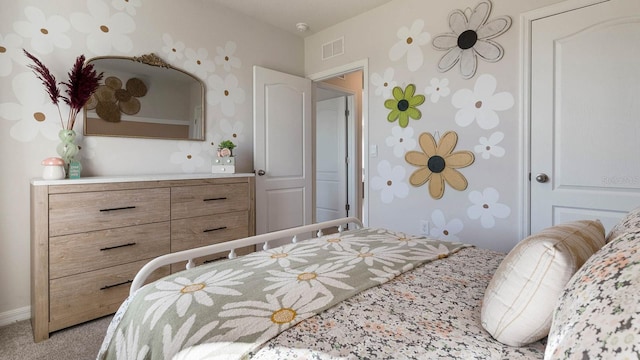 bedroom with light colored carpet, visible vents, and baseboards