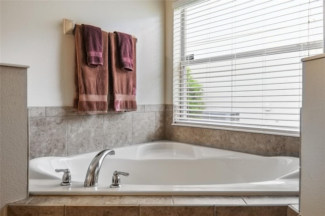 full bathroom with a bath